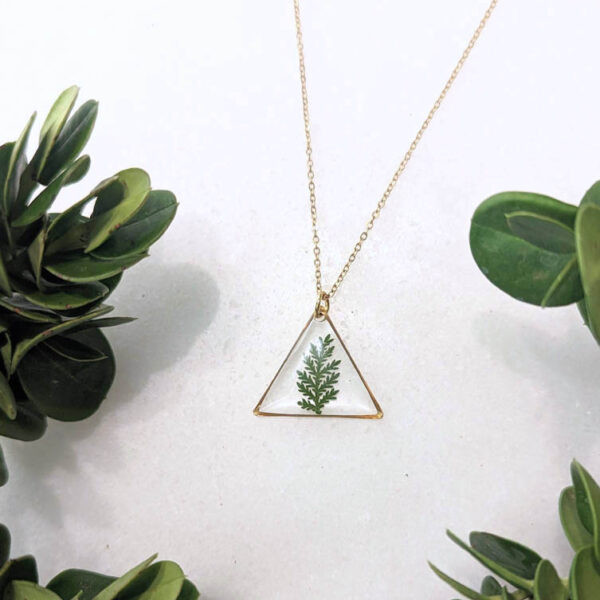 apex cedar necklace - a triangle window pendant with a real green cedar foliage inside